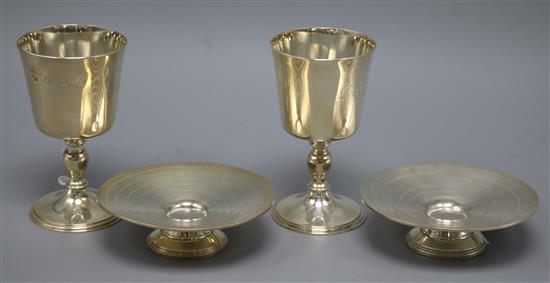 A pair of silver circular silver tazzas, Adie Bros. Birmingham 1946 and a pair of silver goblets, London 1972, Wakely & Wheeler,